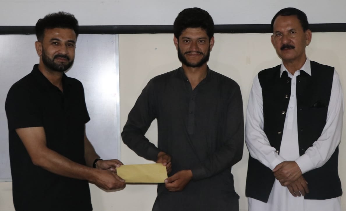 Cheque Distributes Among 32 Flood Affected Students of KIU Ghizer Campus