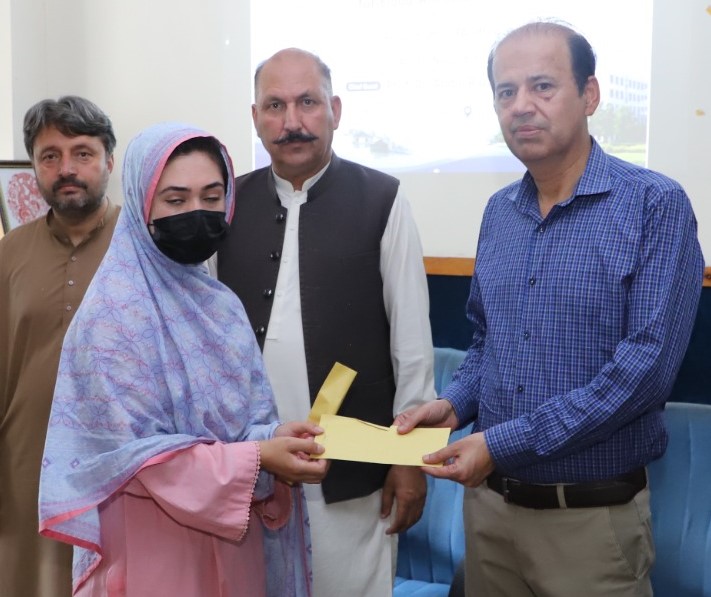 KIU Distributes Cheques Among Flood Affected Students